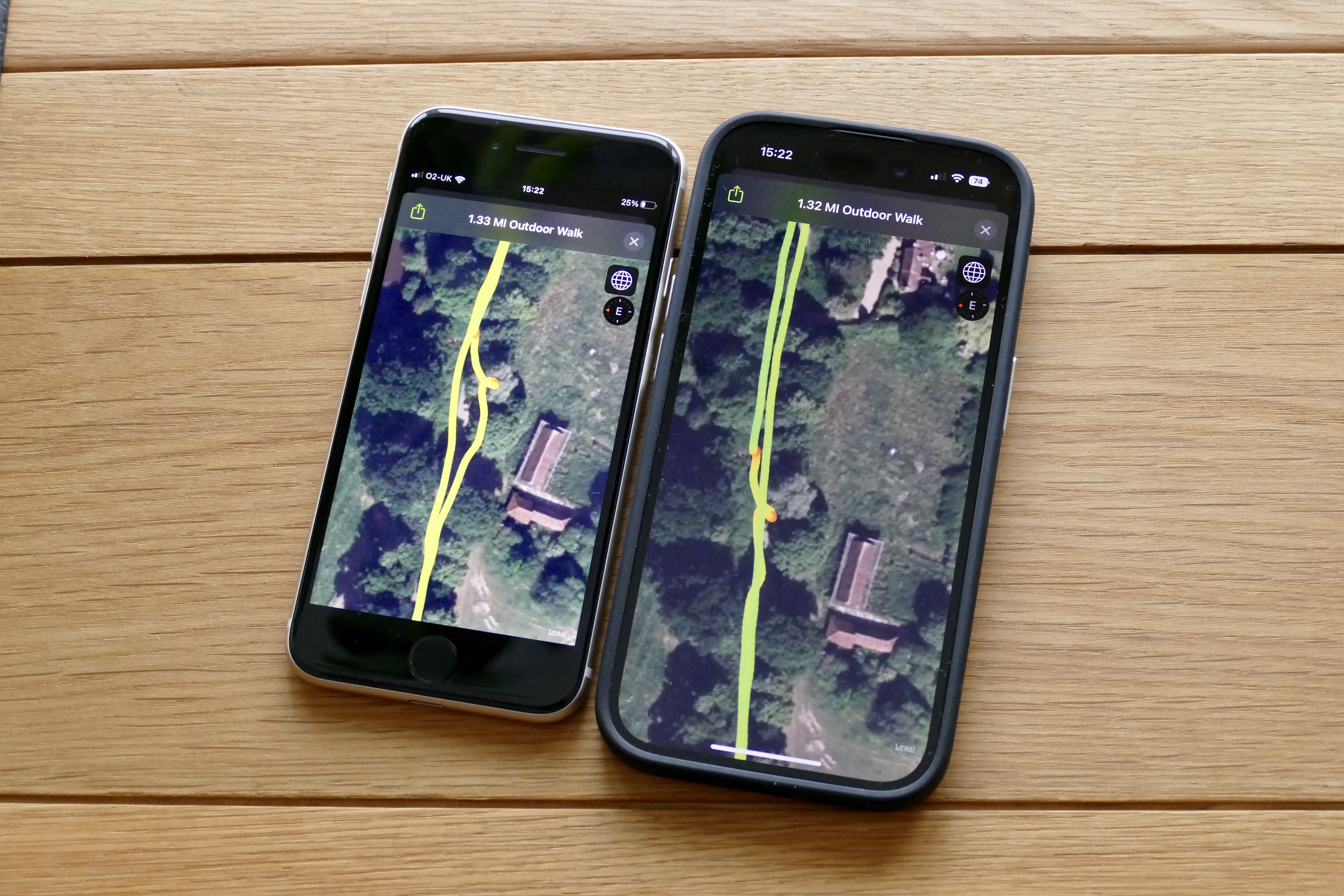 GPS map data from an Apple Watch Ultra and the Apple Watch Series 8 shown on an iPhone 14 Pro and iPhone SE 2022.