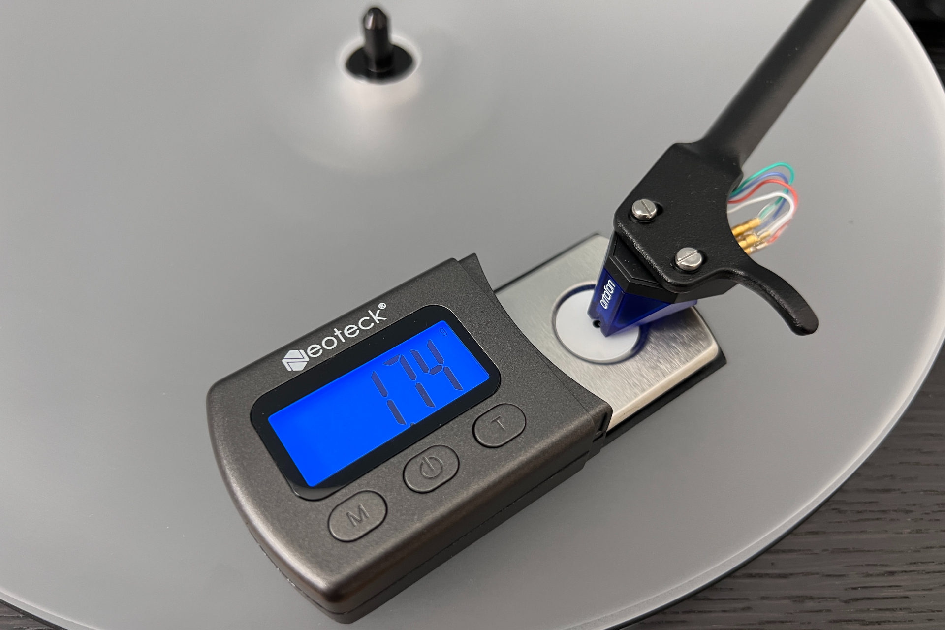 Neoteck Digital Turntable Stylus Force Scale Gauge on a platter.