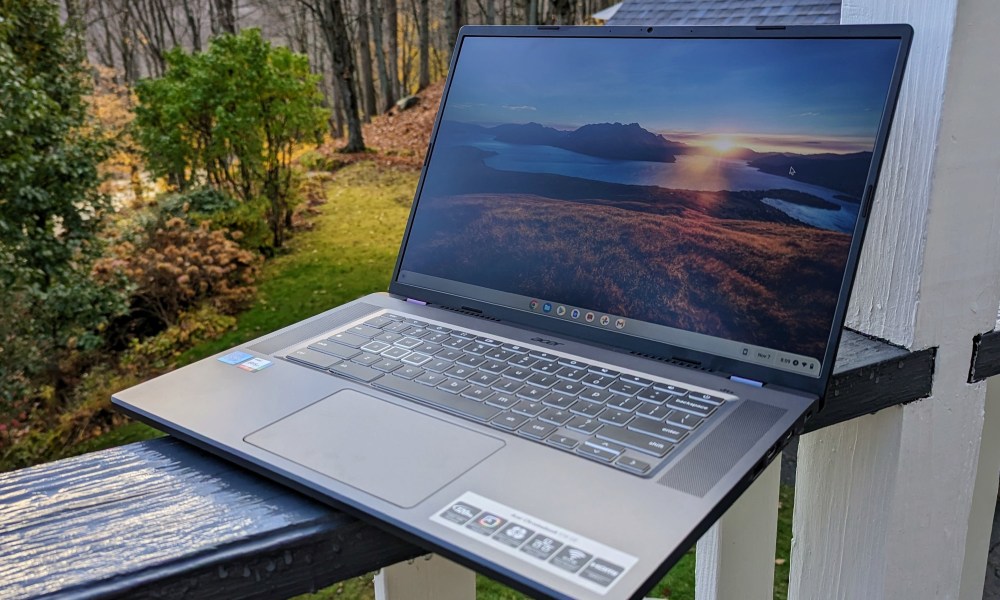 Acer 516 GE on railing outdoors at dawn.