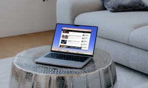 Google Chrome with pinned tabs on a MacBook on a table.