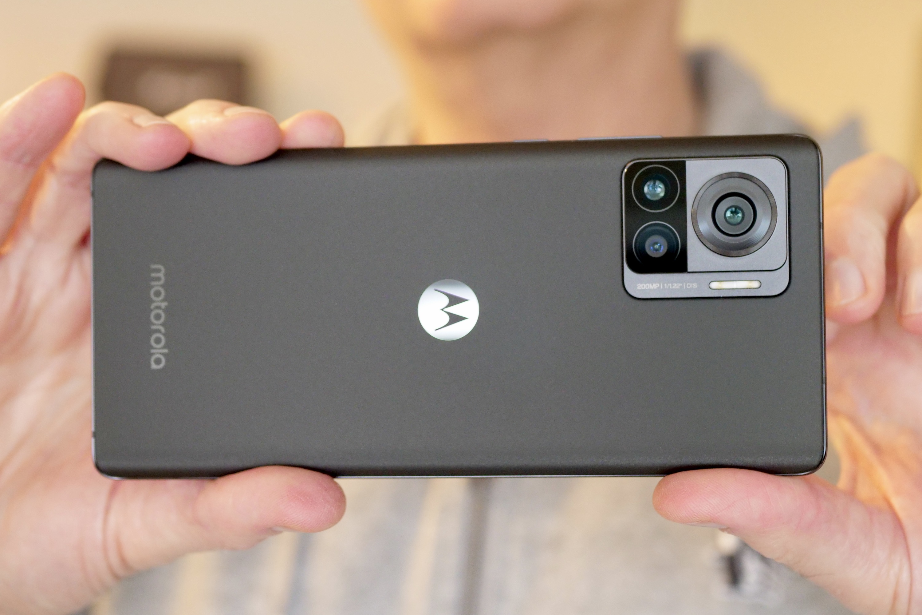 The Motorola Edge 30 Ultra being held like a camera.
