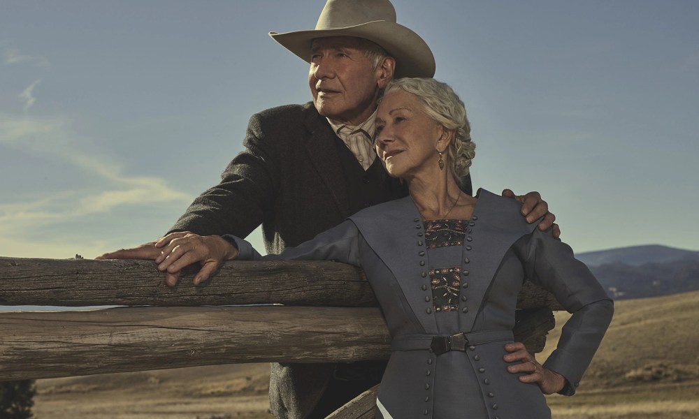 Harrison Ford and Helen Mirren lean against a fence together in 1923.