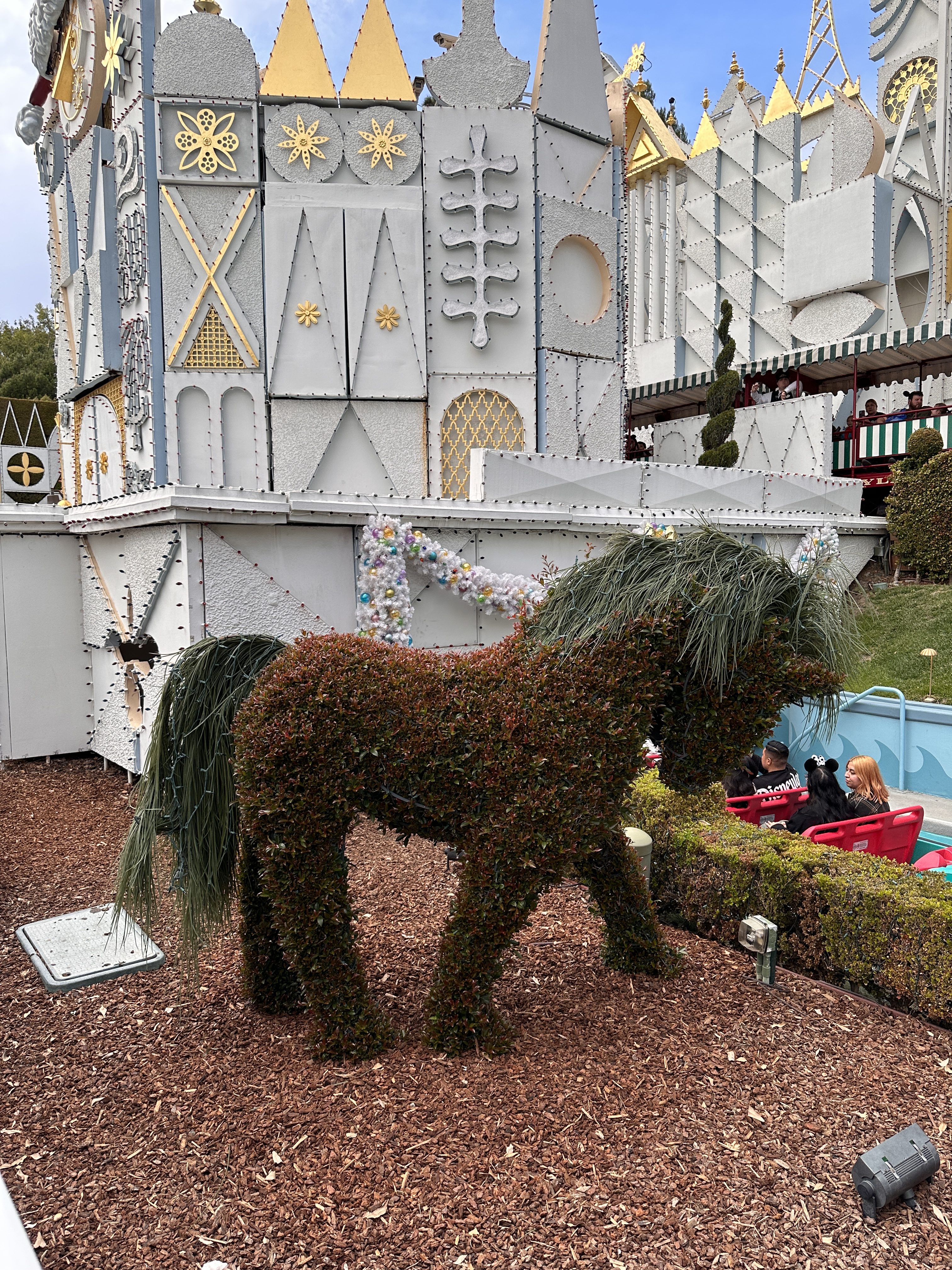 pony hedge at it's a small world holiday warm photographic style