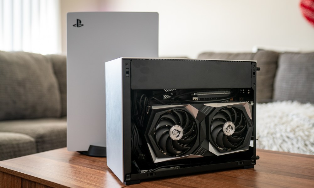 A mini PC sitting in front of the PS5.