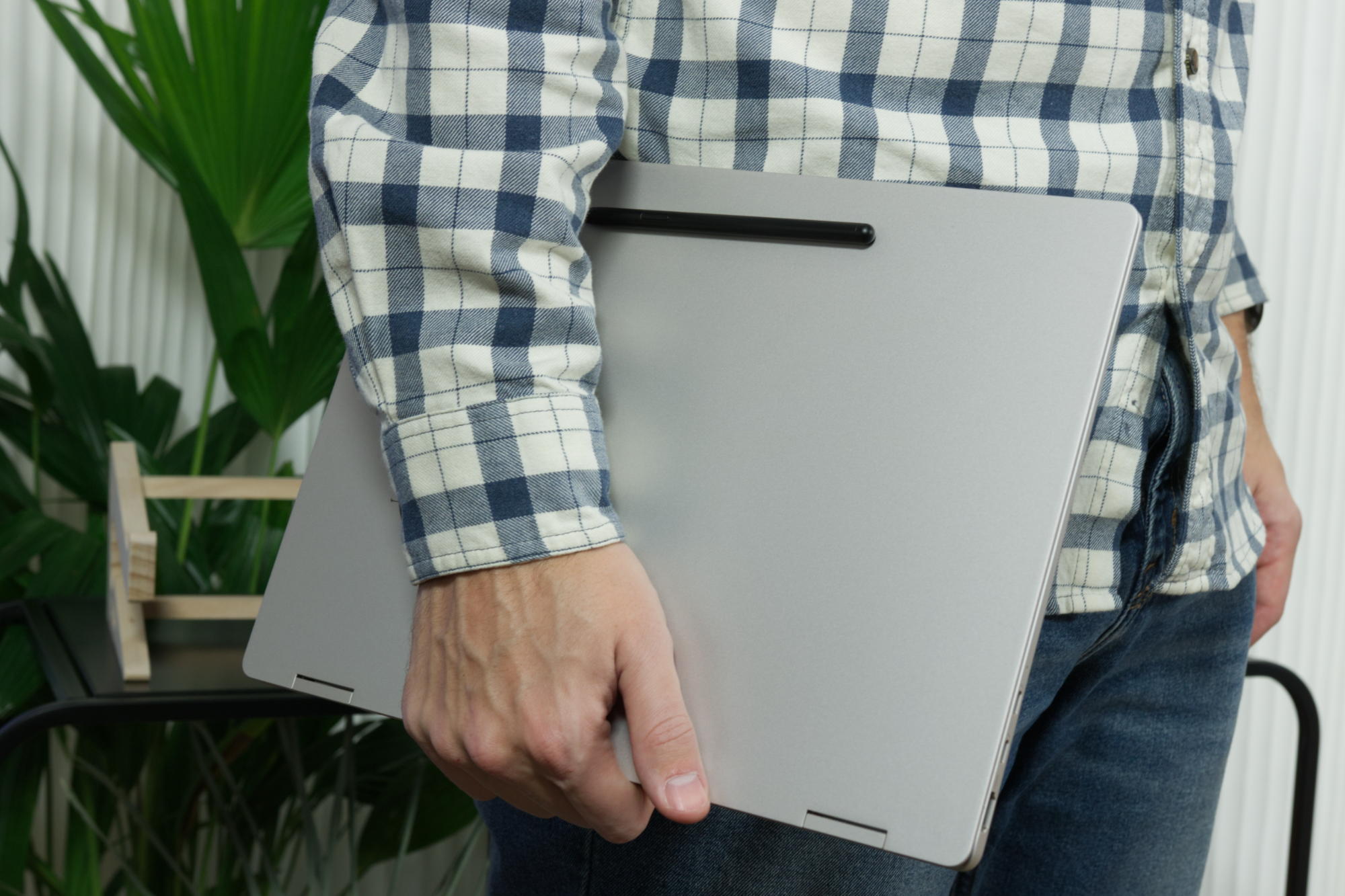 Someone holding the Samsung Galaxy Book 3 Pro 360.