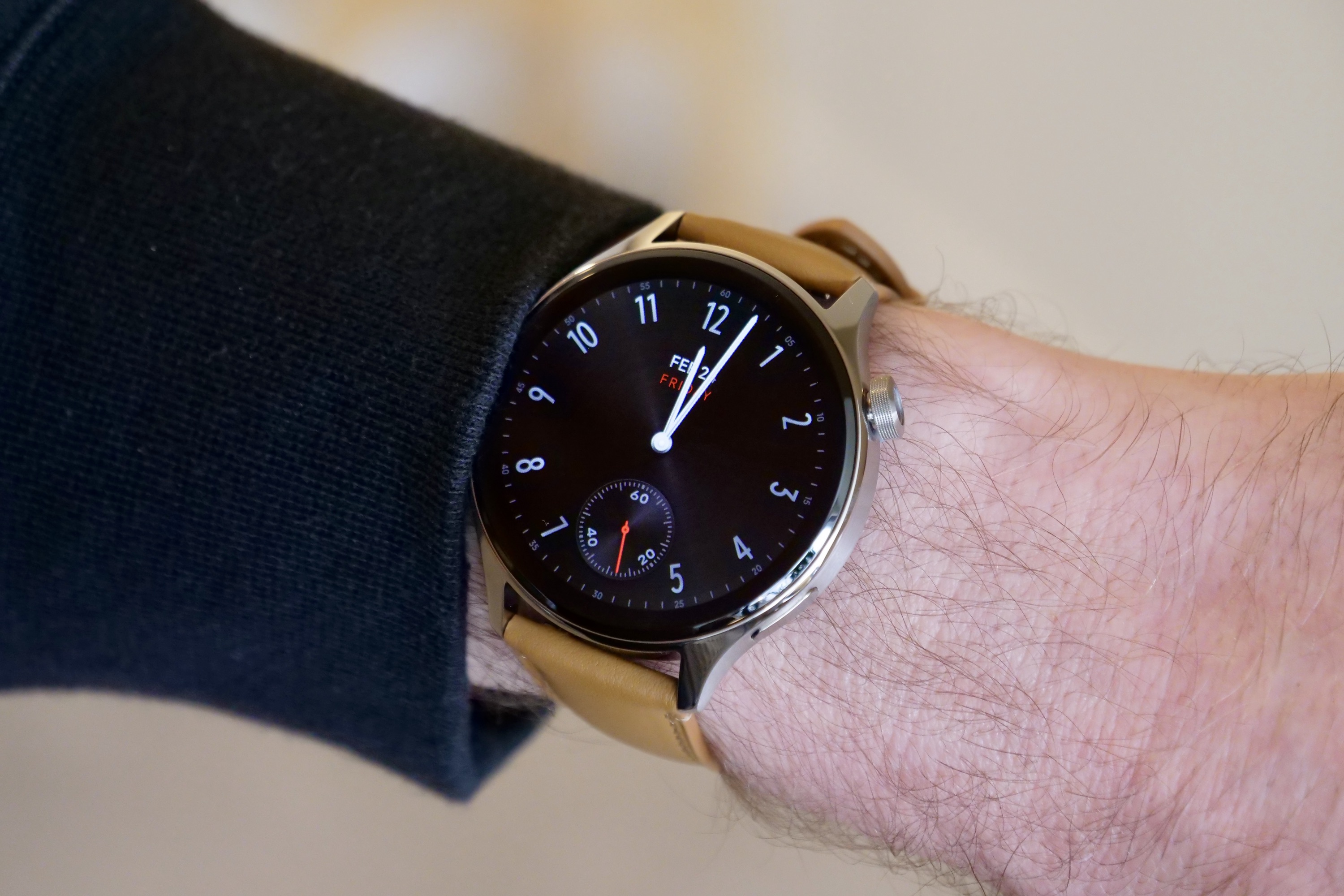 The Xiaomi Watch S1 Pro worn on a person's wrist.