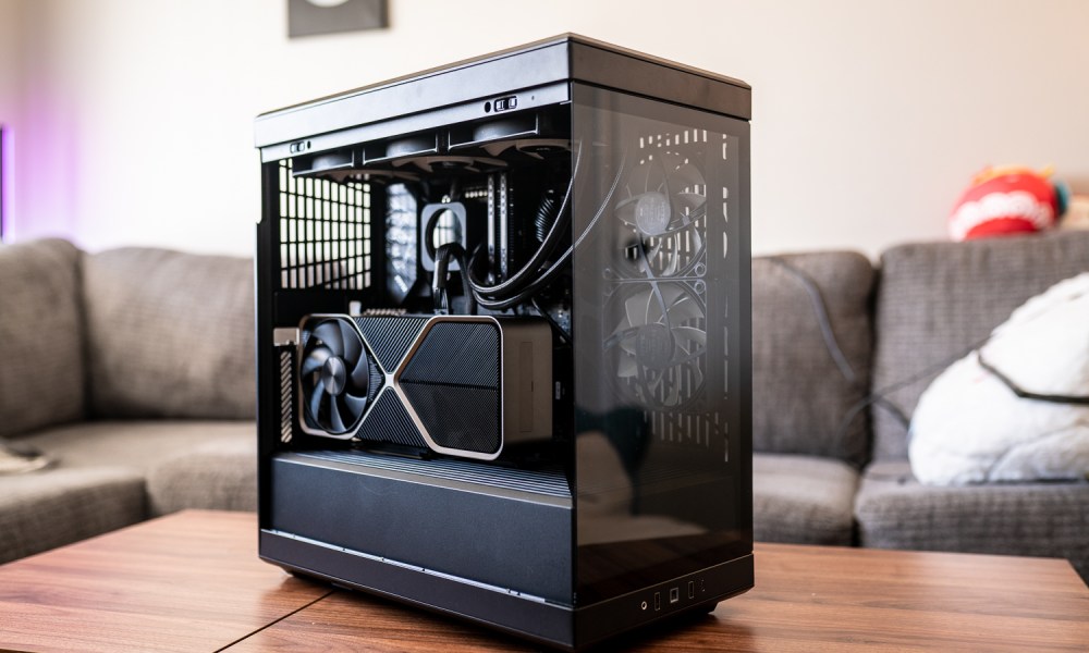 The Hyte Y40 PC case sitting on a coffee table.