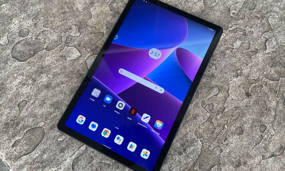 Lenovo Tab M10 on a stone surface.