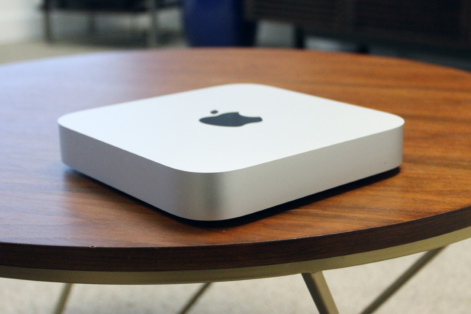 Apple Mac Mini side view showing edges.