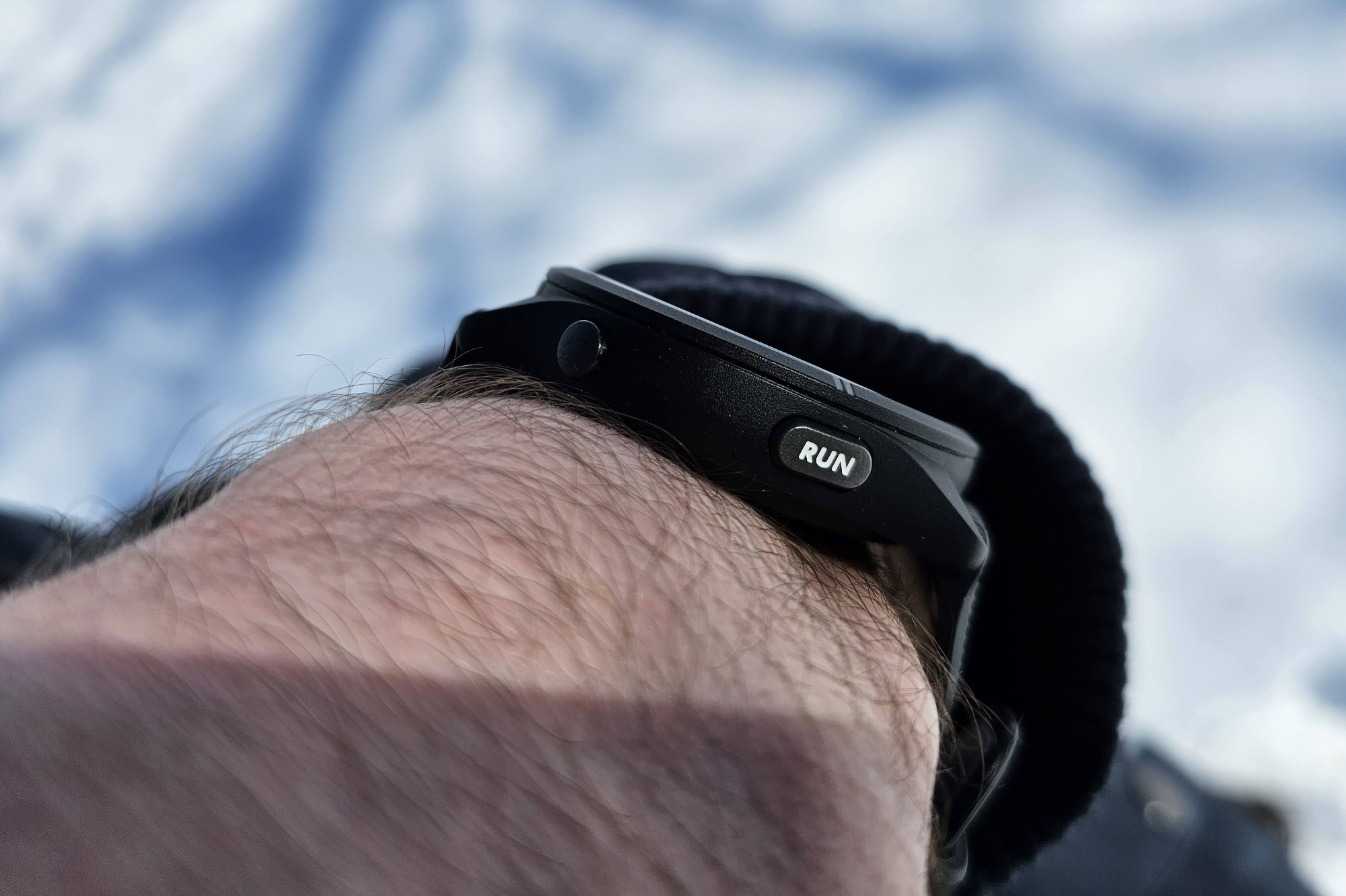 Someone wearing the Garmin Forerunner 265 on their wrist.