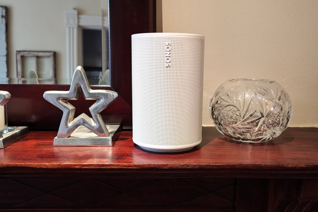 A Sonos Era 100 on a dresser.