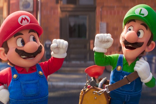 Mario and Luigi raise their fists together in The Super Mario Bros. Movie.