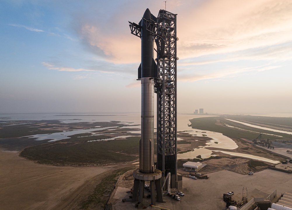 The Starship, comprising the first-stage Super Heavy and the upper-stage Starship spacecraft, on the launchpad at SpaceX's facility in Boca Chica, Texas.