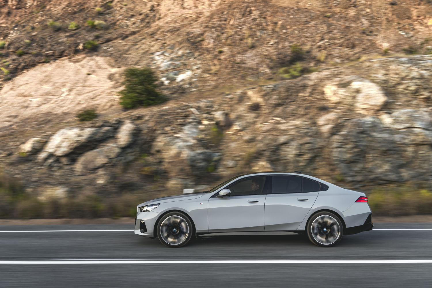 A silver 2024 BMW i5.