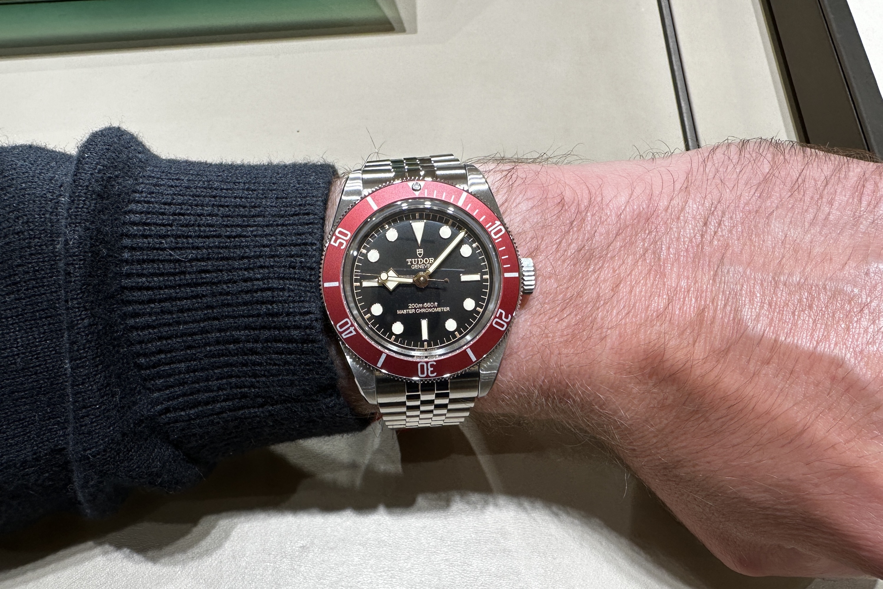 A Tudor Black Bay 41mm on a person's wrist.