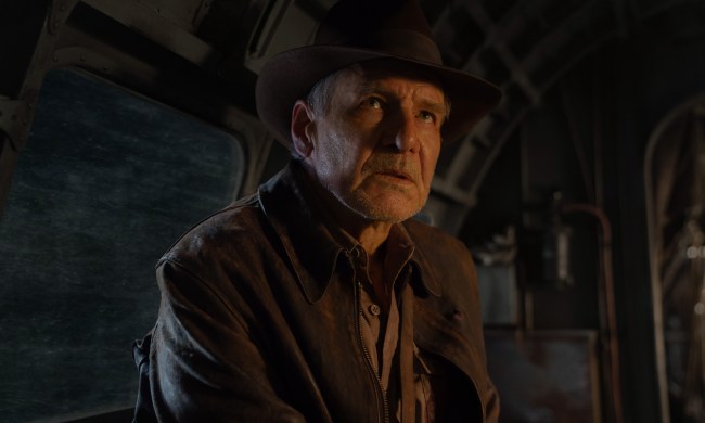 Harrison Ford sits in an airplane in Indiana Jones and the Dial of Destiny.