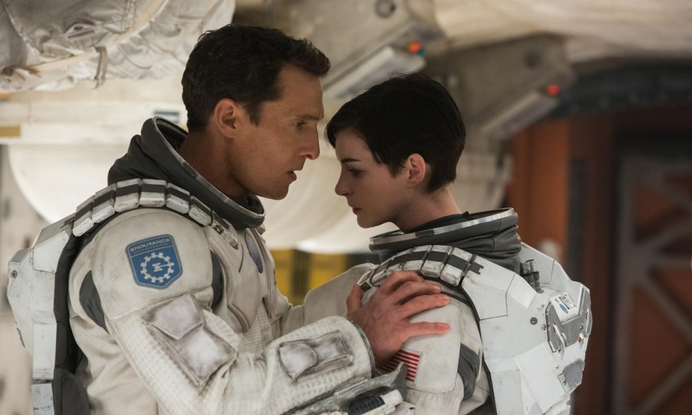 Matthew McConaughey grips Anne Hathaway's shoulders in Interstellar.