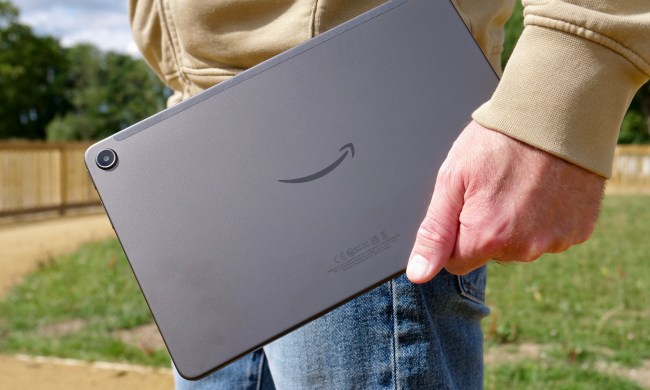 A person holding the Amazon Kindle Fire Max 11