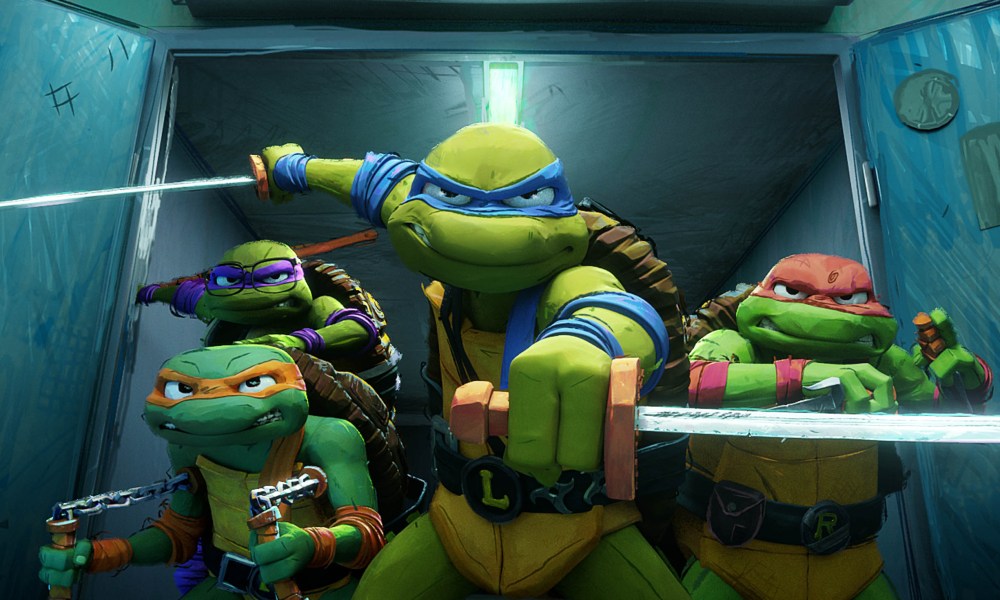 Leonardo stands in front of his brothers in Teenage Mutant Ninja Turtles: Mutant Mayhem.