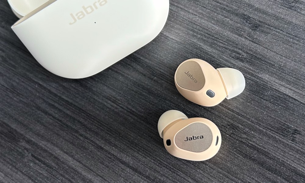 Jabra Elite 10 earbuds in front of case.