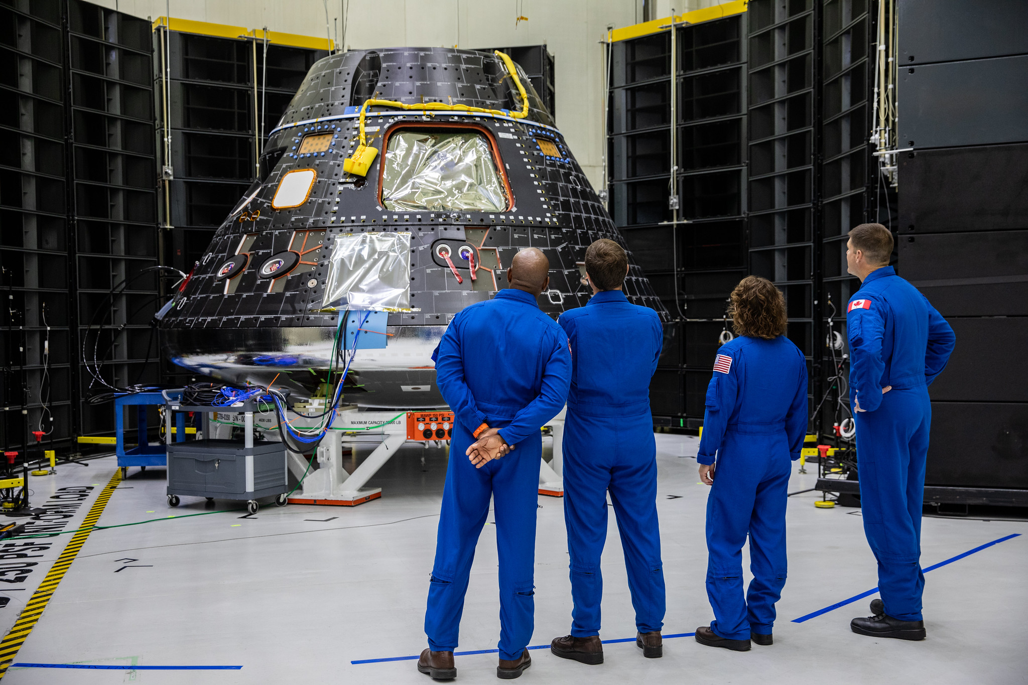 Artemis II crew members, shown inside the Neil Armstrong Operations and Checkout Building at NASA’s Kennedy Space Center in Fl