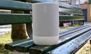 Sonos Move 2 in white on green park bench.