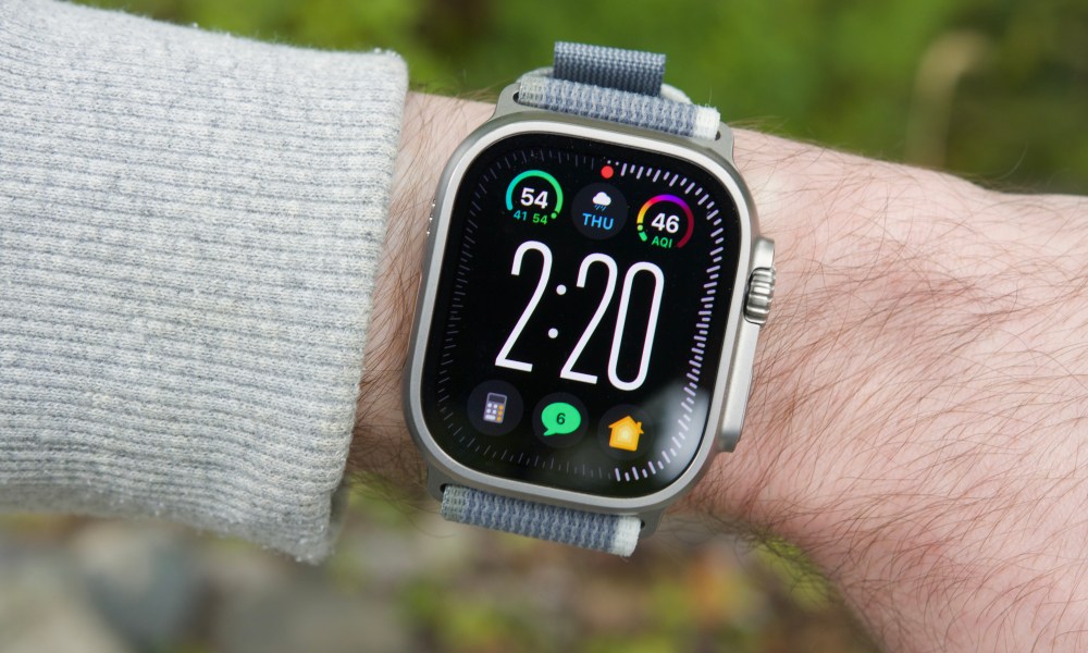 Someone wearing an Apple Watch Ultra 2, showing the Modular Ultra watch face.