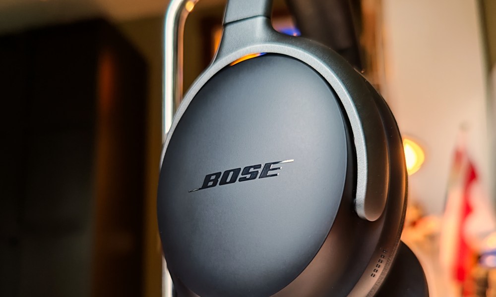 Bose QuietComfort Ultra Headphones: Earcup/logo close-up.