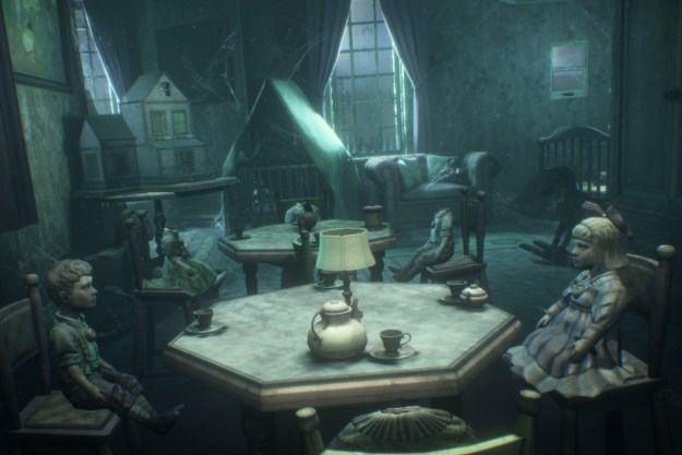 Dolls sit at a table in The 7th Guest VR.