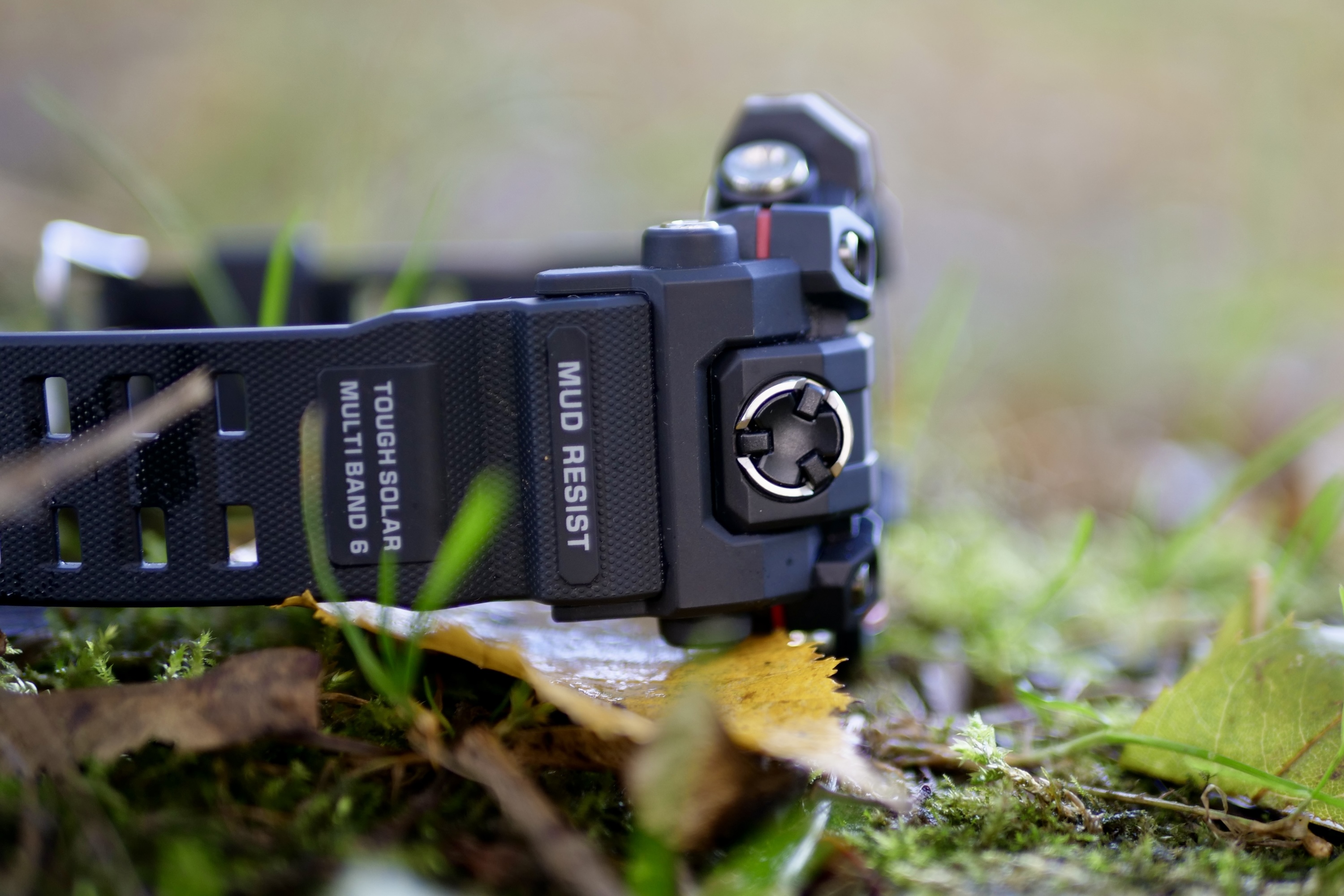 The G-Shock GW-9500 Mudman on some mud and grass.