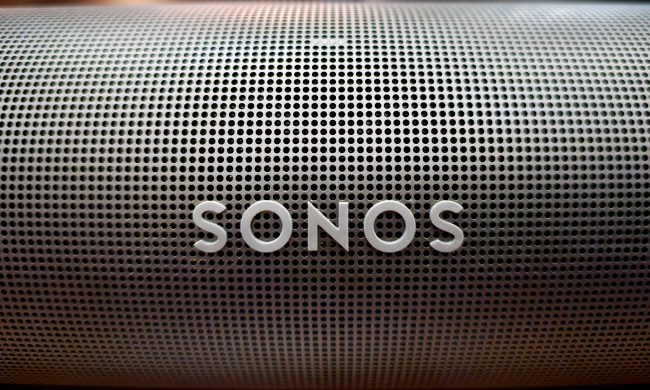 Close up of Sonos logo on a Sonos Arc soundbar.