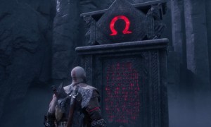 Kratos standing by a stone monolith.