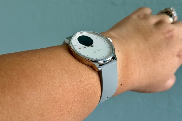 Withings ScanWatch Light being worn on wrist with display off.