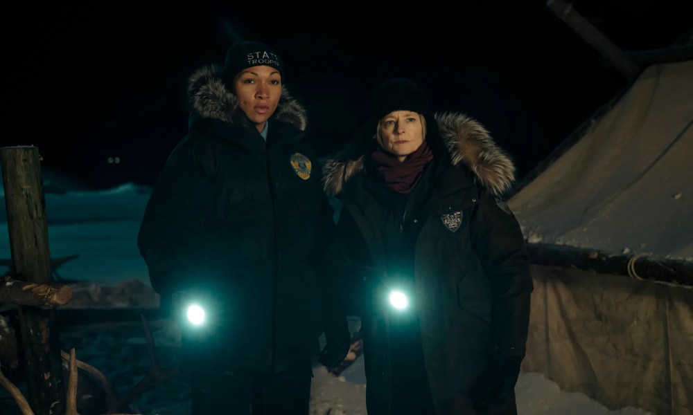 Kali Reis and Jodie Foster hold flashlights in True Detective: Night Country.