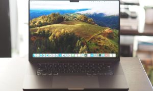 Apple MacBook Pro 16 front view showing display and keyboard.