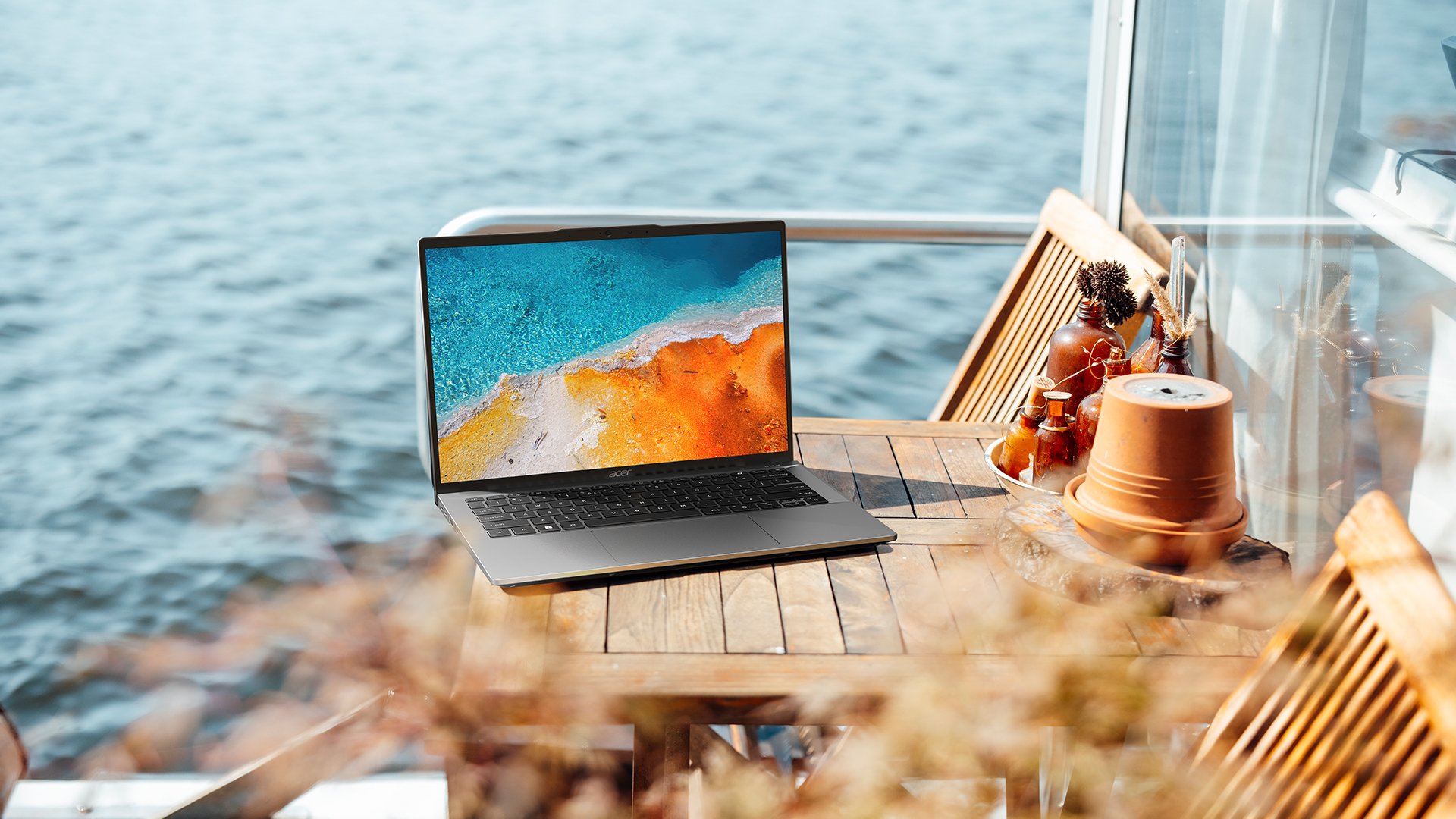 The Acer Swift Go 14 2024 laptop placed on a wooden table.