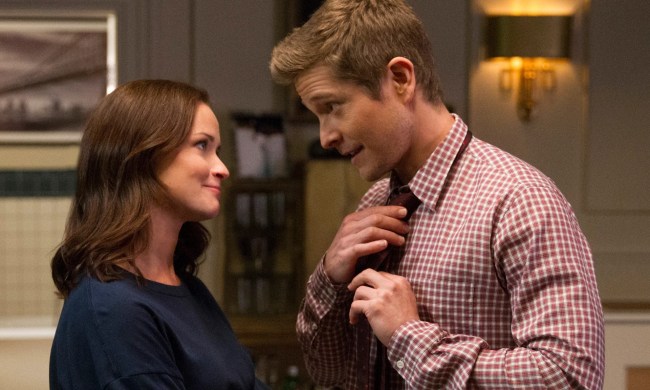 A man and a woman look at each other in Gilmore Girls: A Year in the Life.