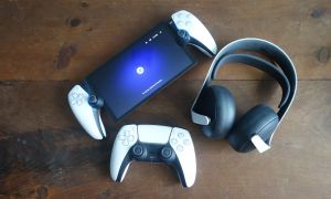 A Pulse Elite, DualSense, and PlayStation Portal sit on a table.