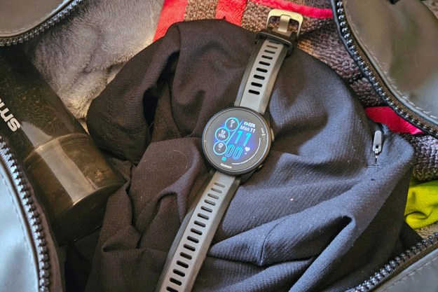 The Garmin Forerunner 165 Music sat in an open gym bag.