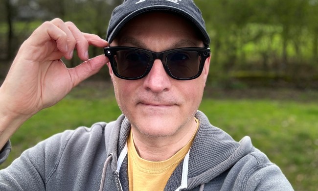 A person wearing the Ray-Ban Meta smartglasses, taking a photo.