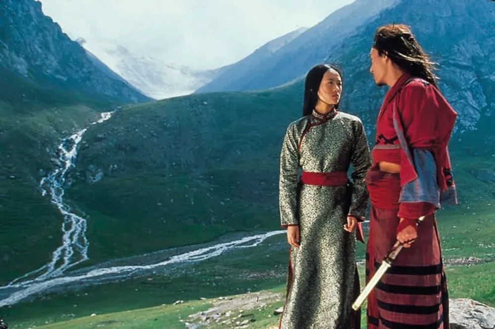 Two people stand in a mountain valley in Crouching Tiger, Hidden Dragon.