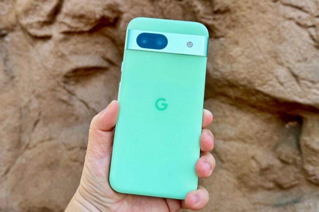 A person holding the Google Pixel 8a