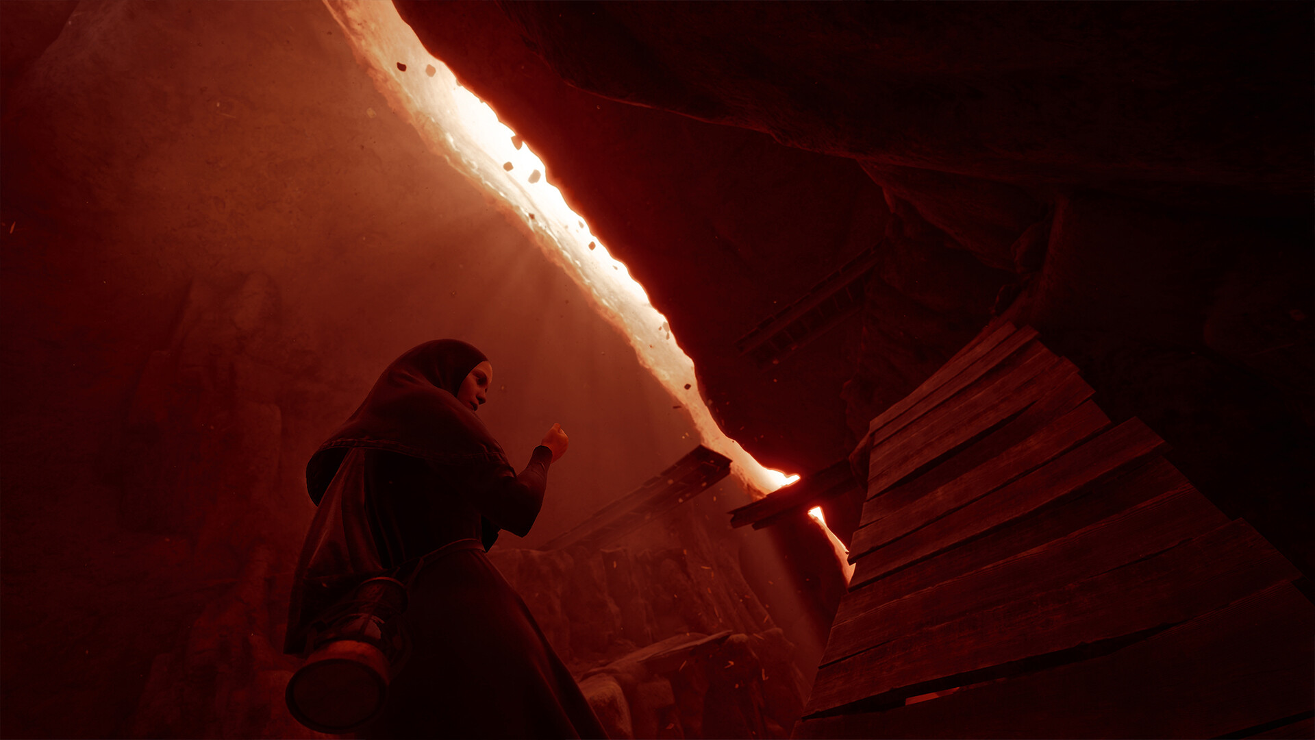 A nun stands in a red room in Indika.