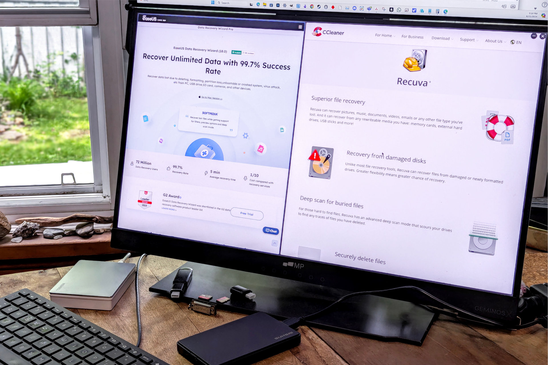 A photo of EaseUS Data Recovery Wizard Pro and Recuva Professional side-by-sdie on a PC monitor.