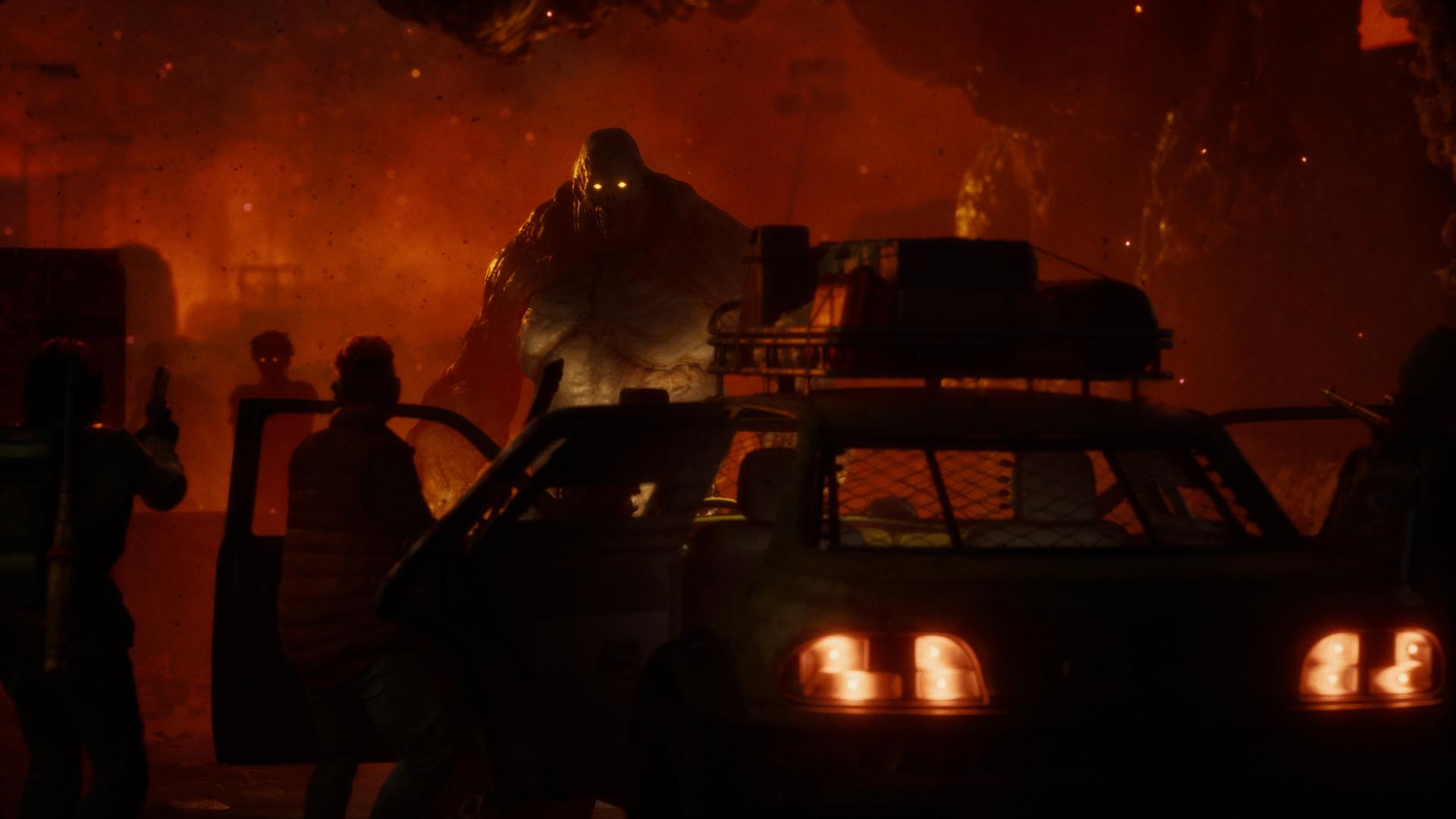 A massive undead creature blocks the path of survivors in State of Decay 3.