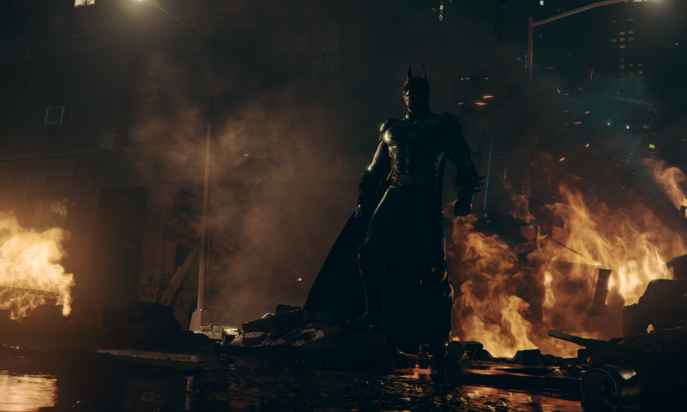 Batman stands near fire in Batman: Arkham Shadow.