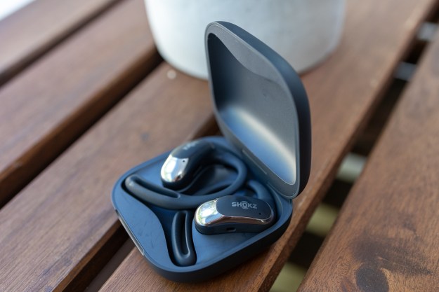 The Shokz OpenFit Air in their charging case.