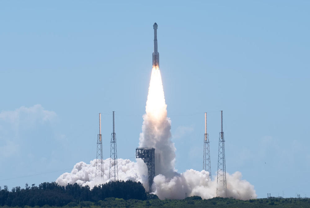 A ULA Atlas V rocket transporting the Starliner spacecraft to orbit.