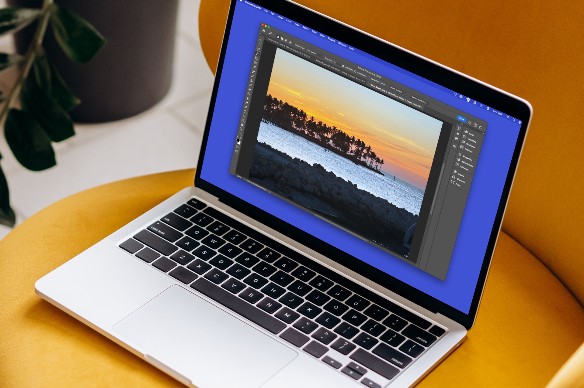 Edit a picture in Photoshop on a MacBook.