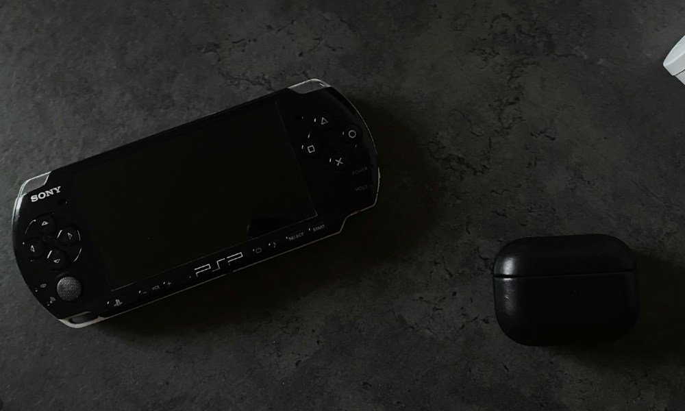 A PlayStation Portable (PSP) on a table.